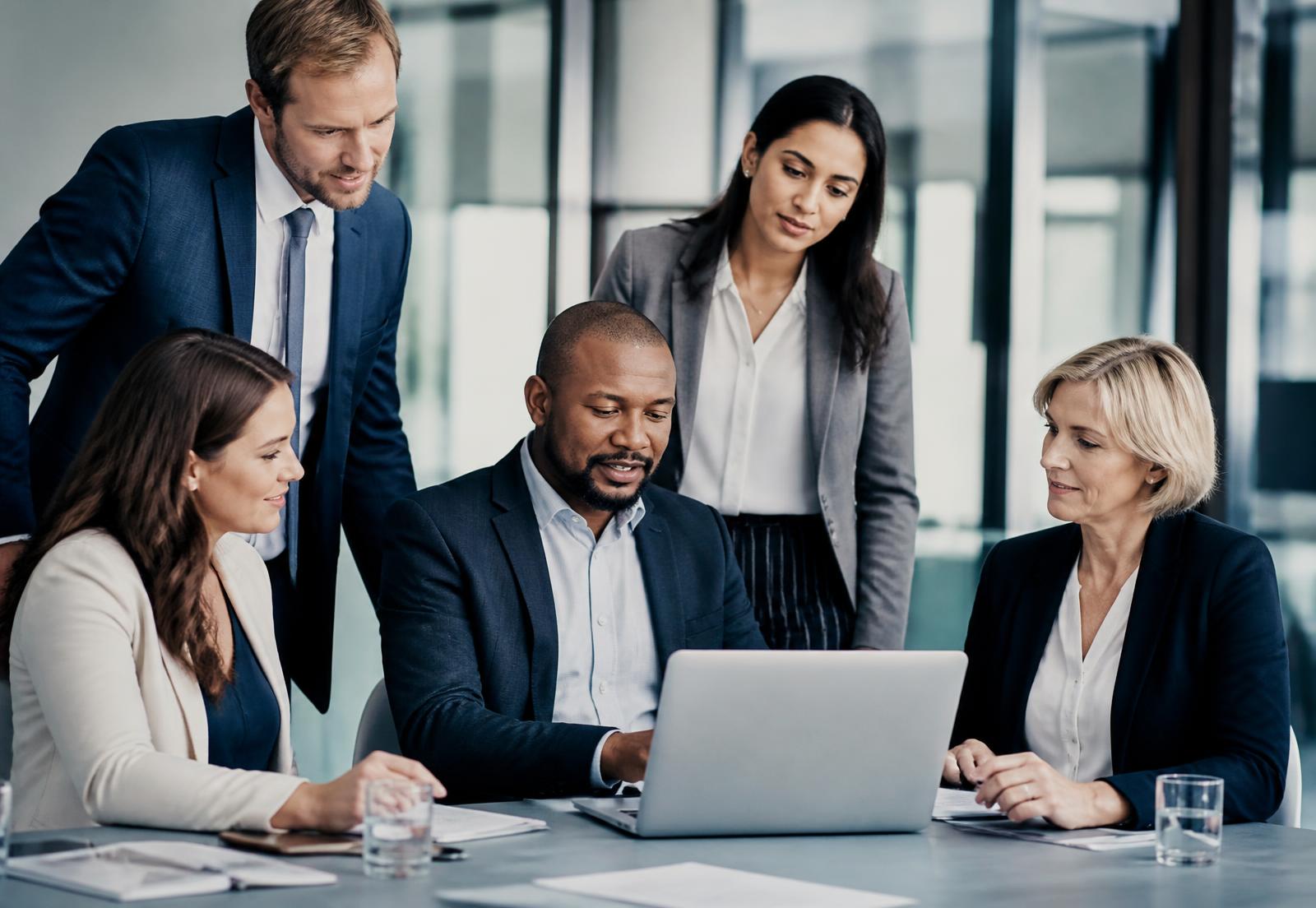 Corporate professionals collaborating in a modern office environment